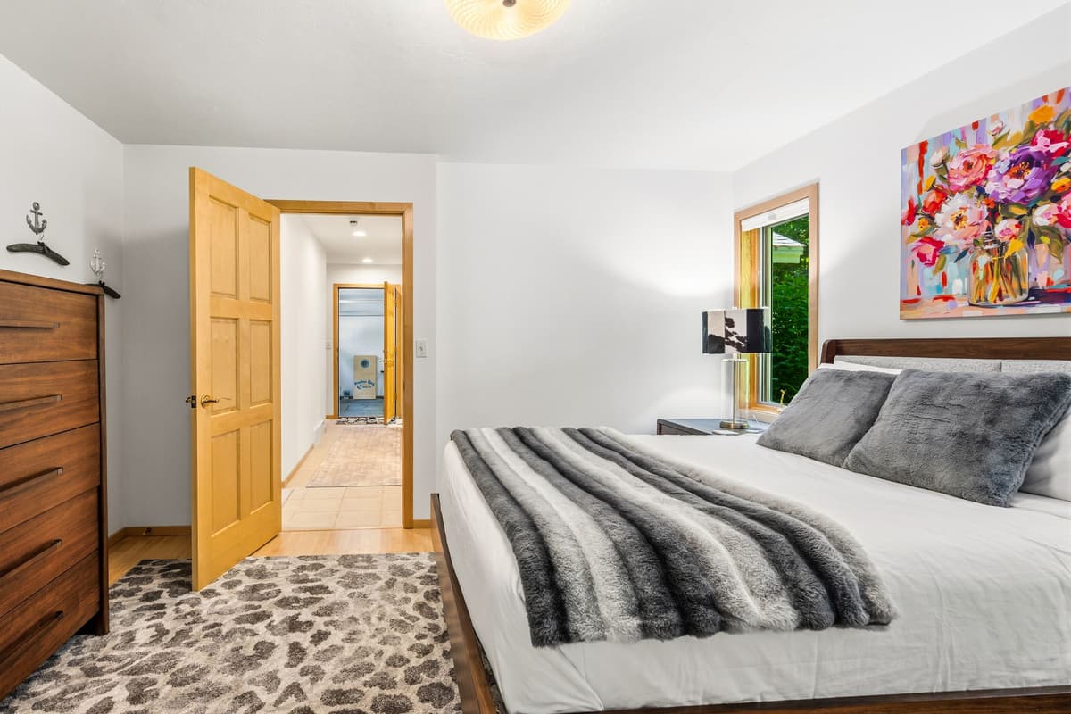 Enjoy a comfortable main-level queen bedroom designed for a relaxing stay.