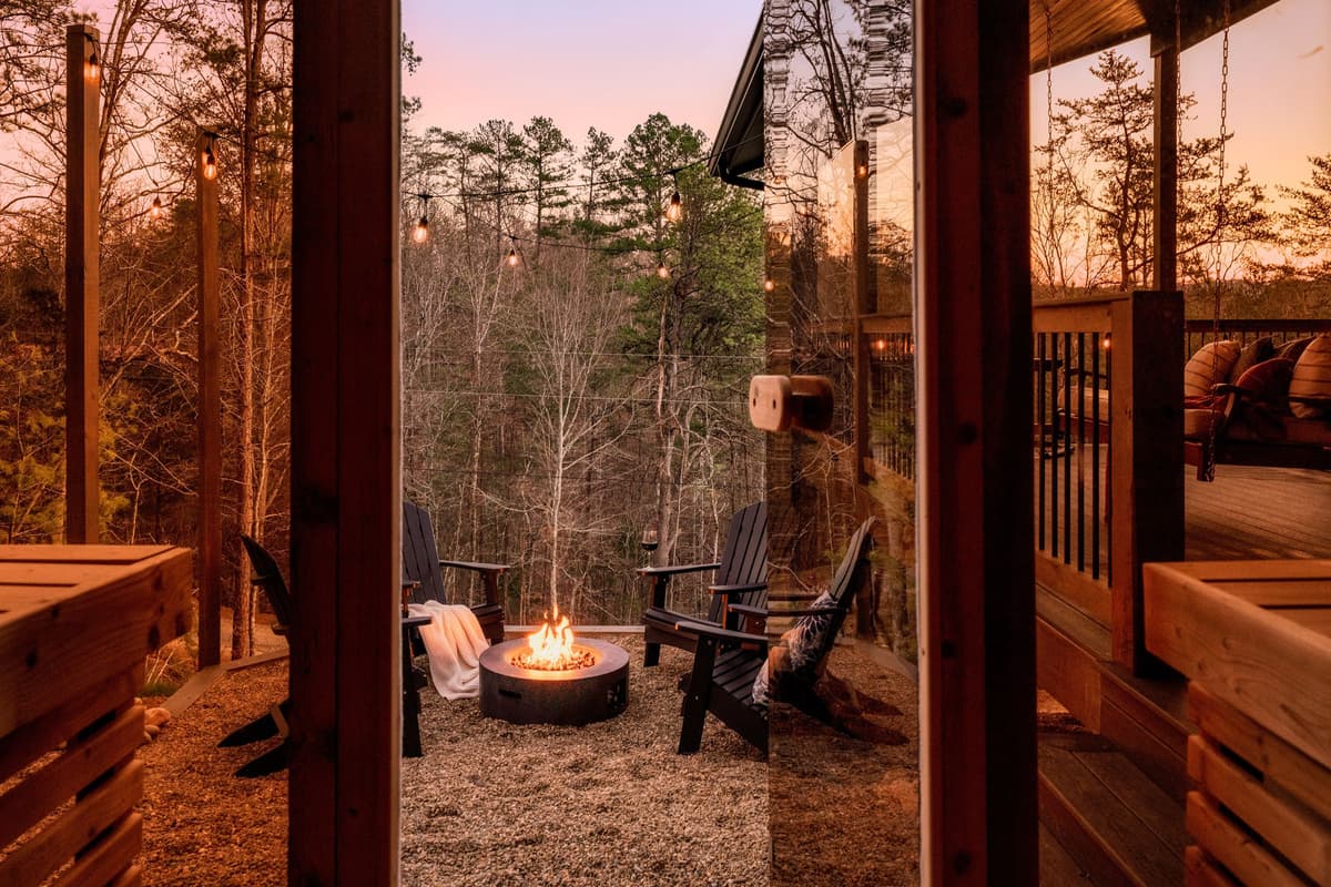 Just steps from the sauna, you’ll find a cozy fire pit area that’s perfect for gathering and enjoying the outdoors.