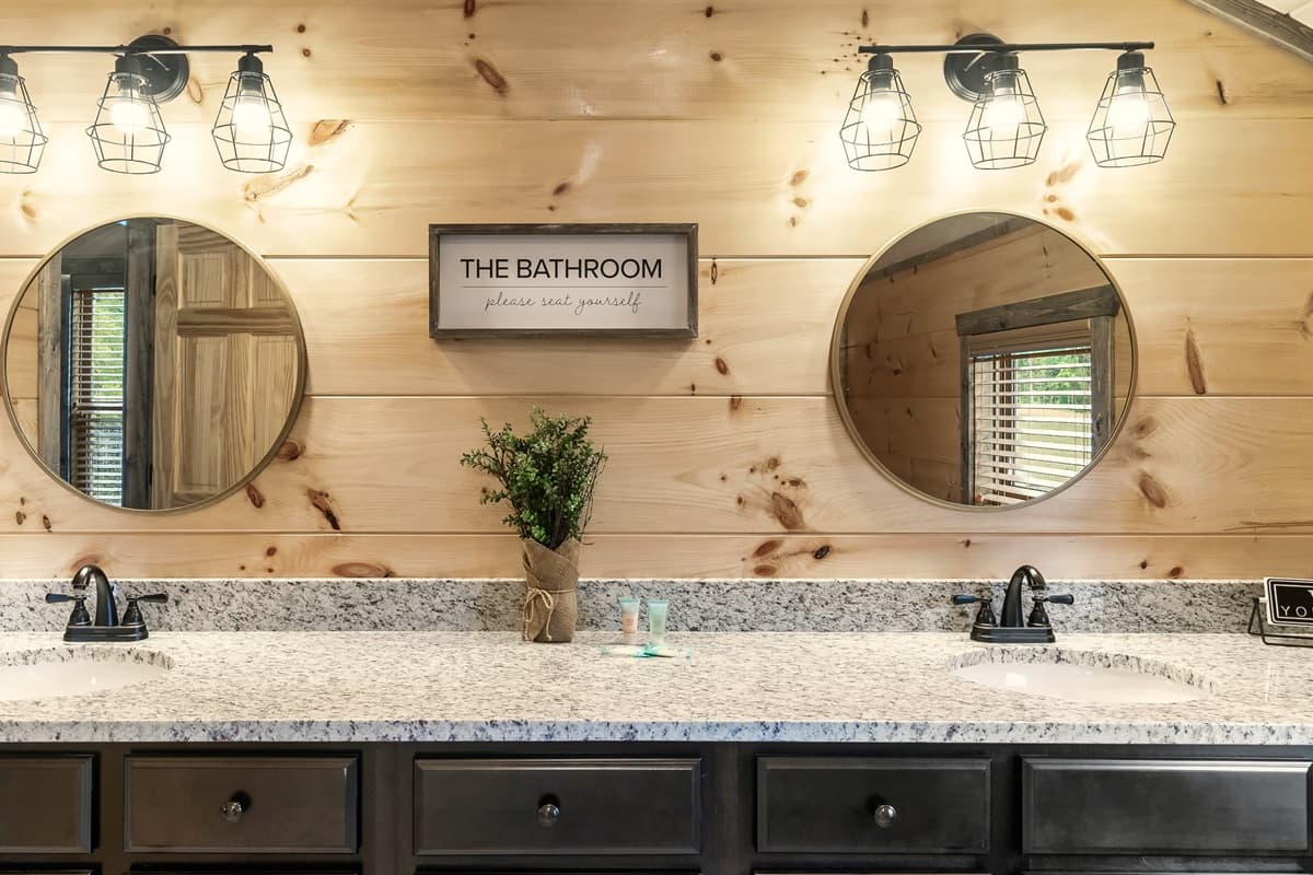 We'll make you a deal: a cozy bathroom with two sinks, perfect for your getaway.