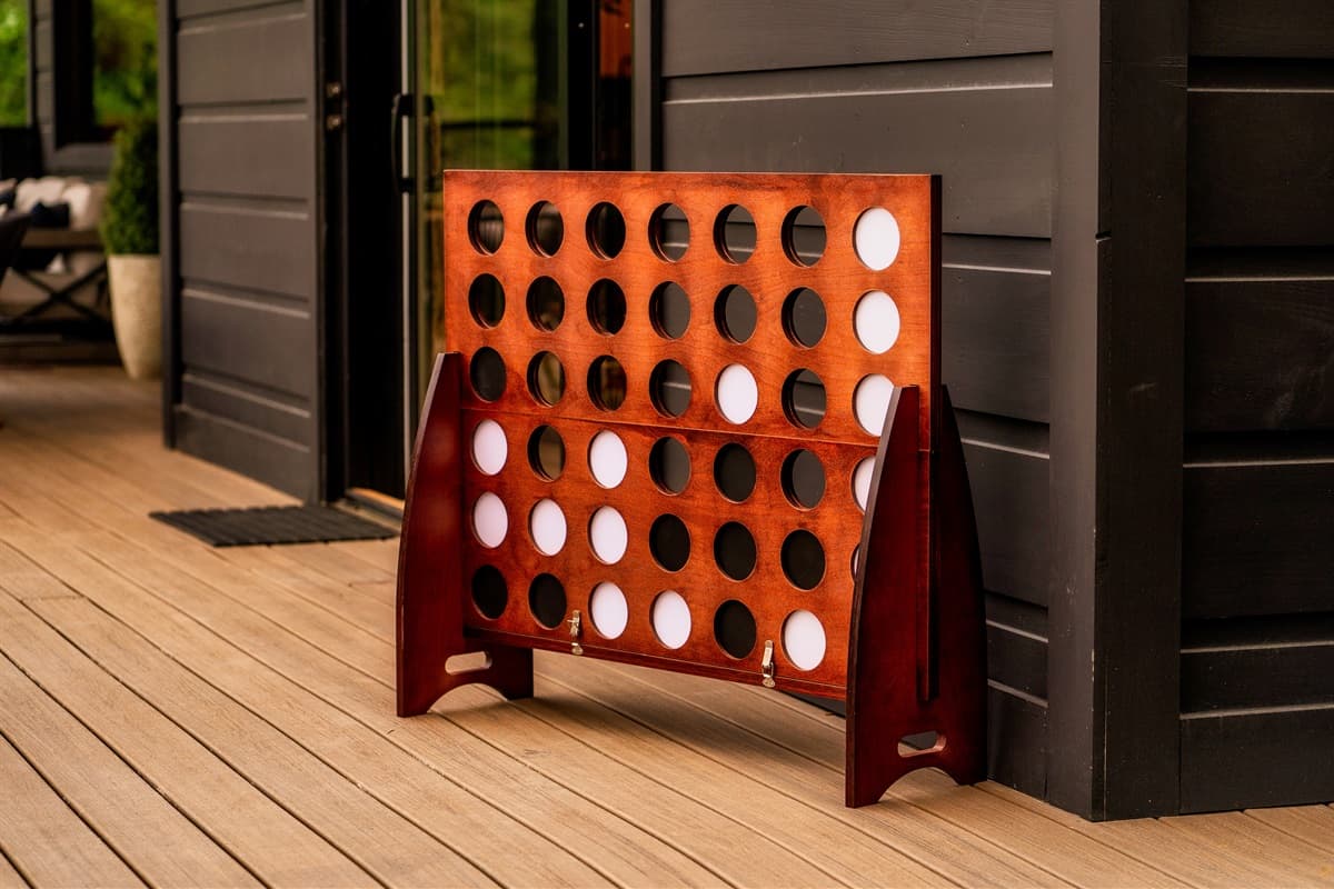 Enjoy oversized fun with a giant outdoor Connect Four game, perfect for friendly competition on the deck.