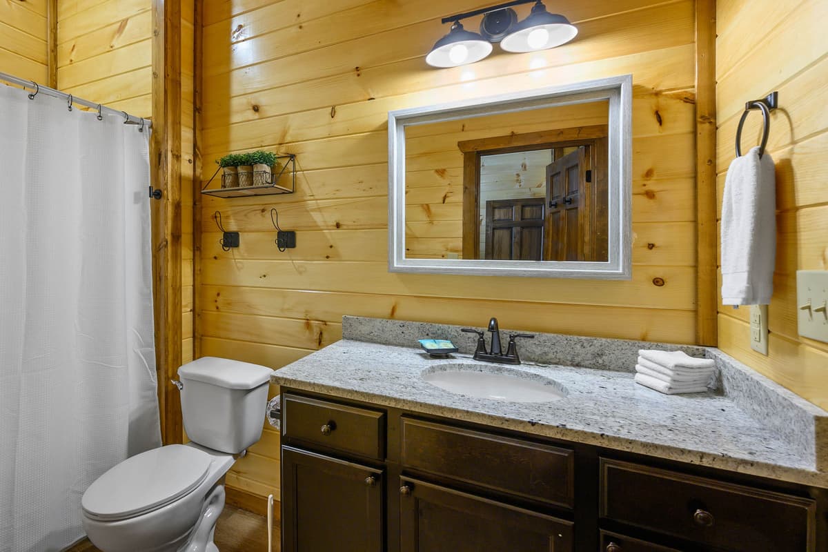 The clean and comfortable space provides everything you need to get ready for your day. Enjoy a convenient setup for getting ready before heading out to explore Pigeon Forge.