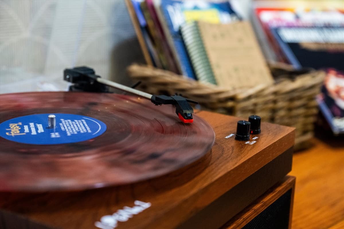 Record Player with a Few Vinyls in the Alcove – Also Has Bluetooth to Connect Your Phone for Music