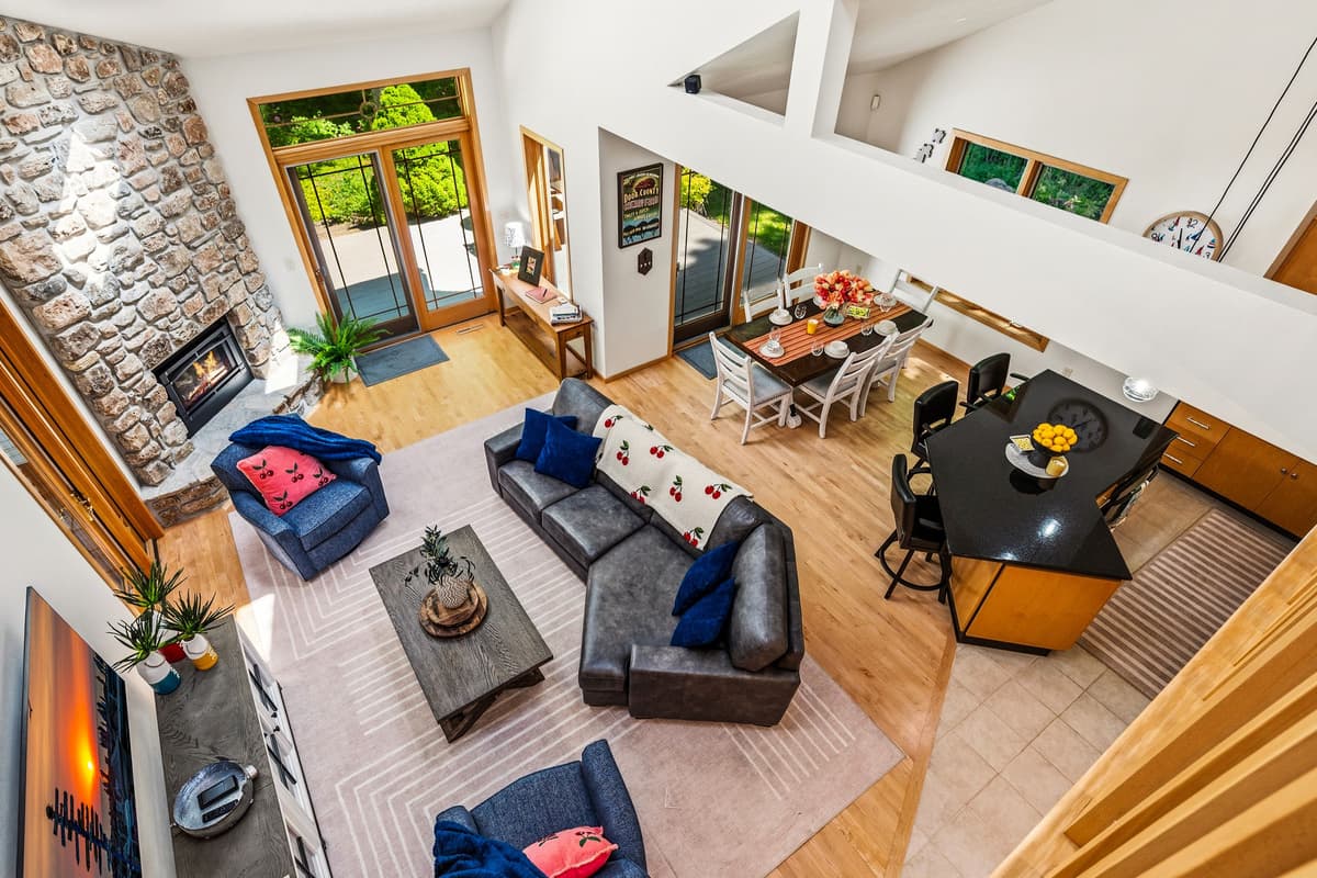 A beautiful overhead view showcasing the spacious open-concept layout, with the kitchen, dining area, and living space thoughtfully connected for easy gathering.