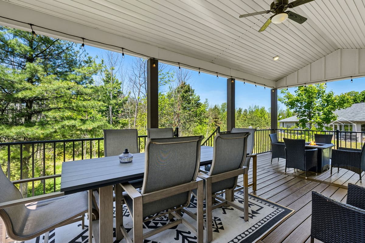 The outdoor dining table provides a comfortable spot for enjoying meals in the fresh air.