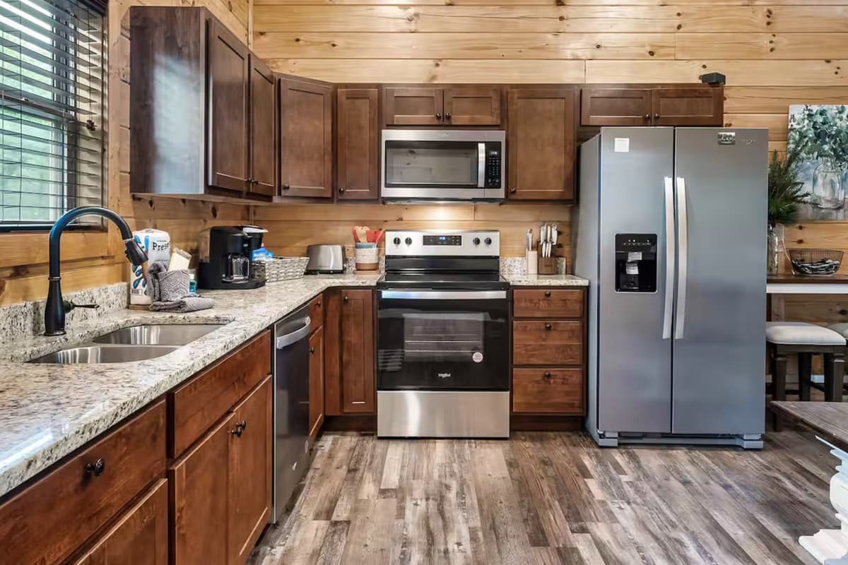 The modern appliances add a stylish touch while making meal preparation easy and convenient.