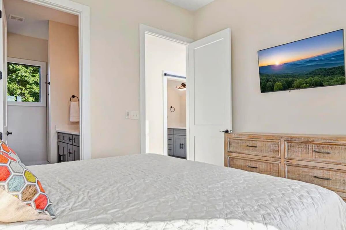 The cozy bedding creates a welcoming space to relax and recharge after a day of adventure.