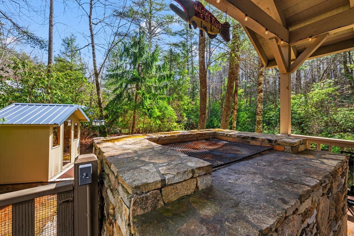Stone Charcoal Grill Close-Up on the Covered Deck – Bring Your Own Charcoal for a Classic Cookout