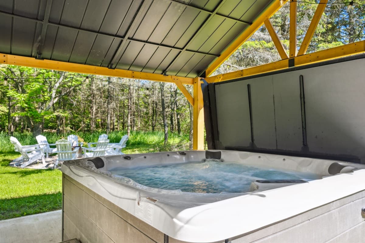 Soak in relaxation and unwind in your own backyard oasis with our 5-seater hot tub.