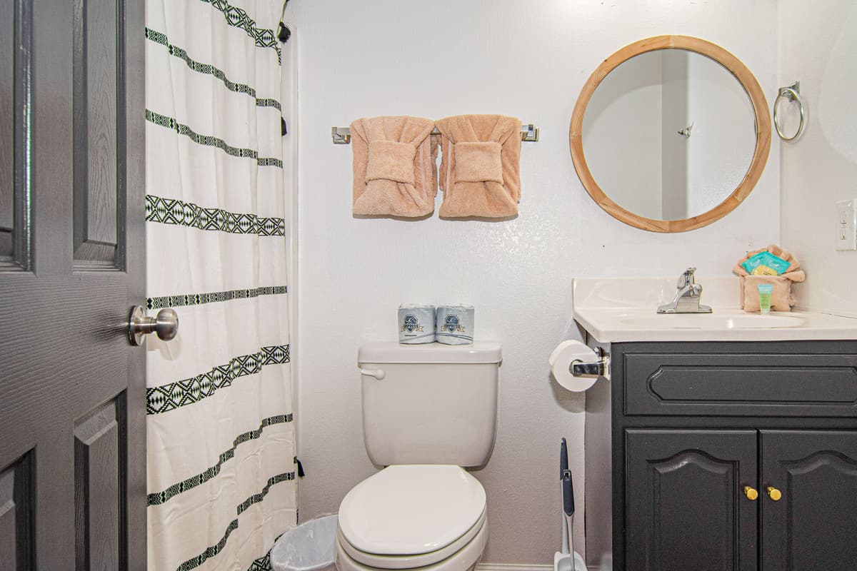 The bunk bedroom includes a convenient private ensuite bathroom.
Guests can easily freshen up without leaving the bedroom.