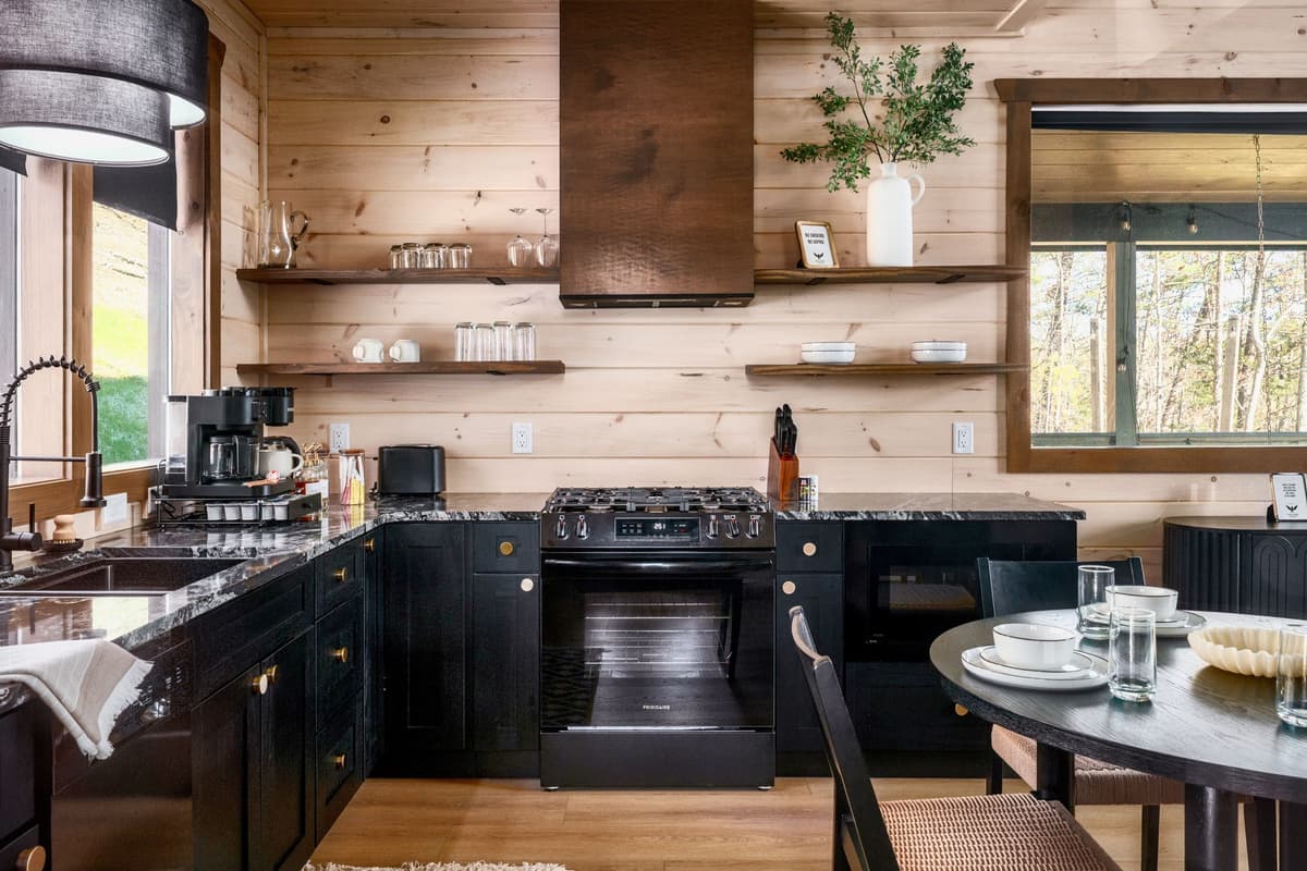 The well-appointed kitchen is thoughtfully designed for both convenience and comfort, with everything you need to prepare meals during your stay.