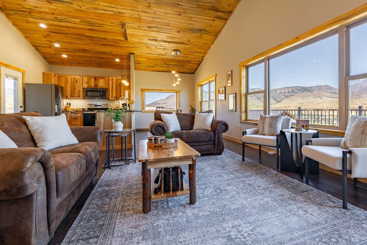 The spacious layout brings the living room, dining area, and kitchen together, making it easy to relax and spend quality time together.
