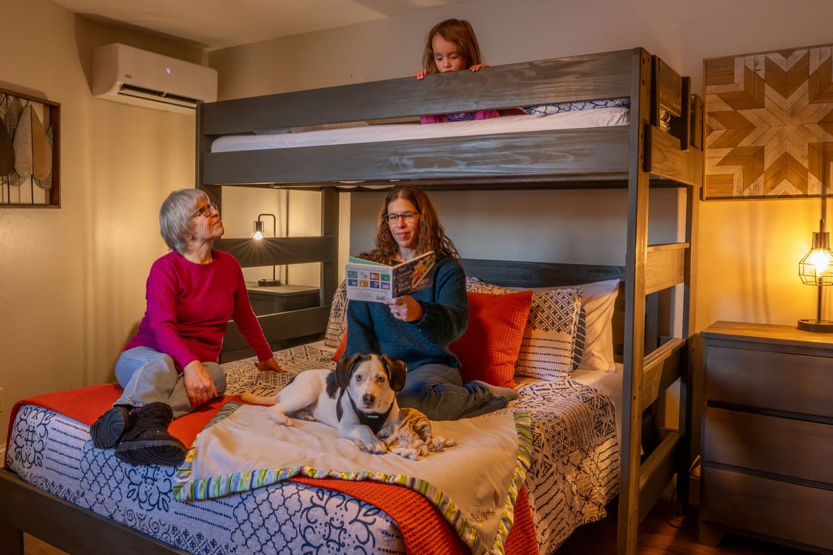 The queen-size bed provides plenty of room for two, while the twin bunk is perfect for an additional guest.