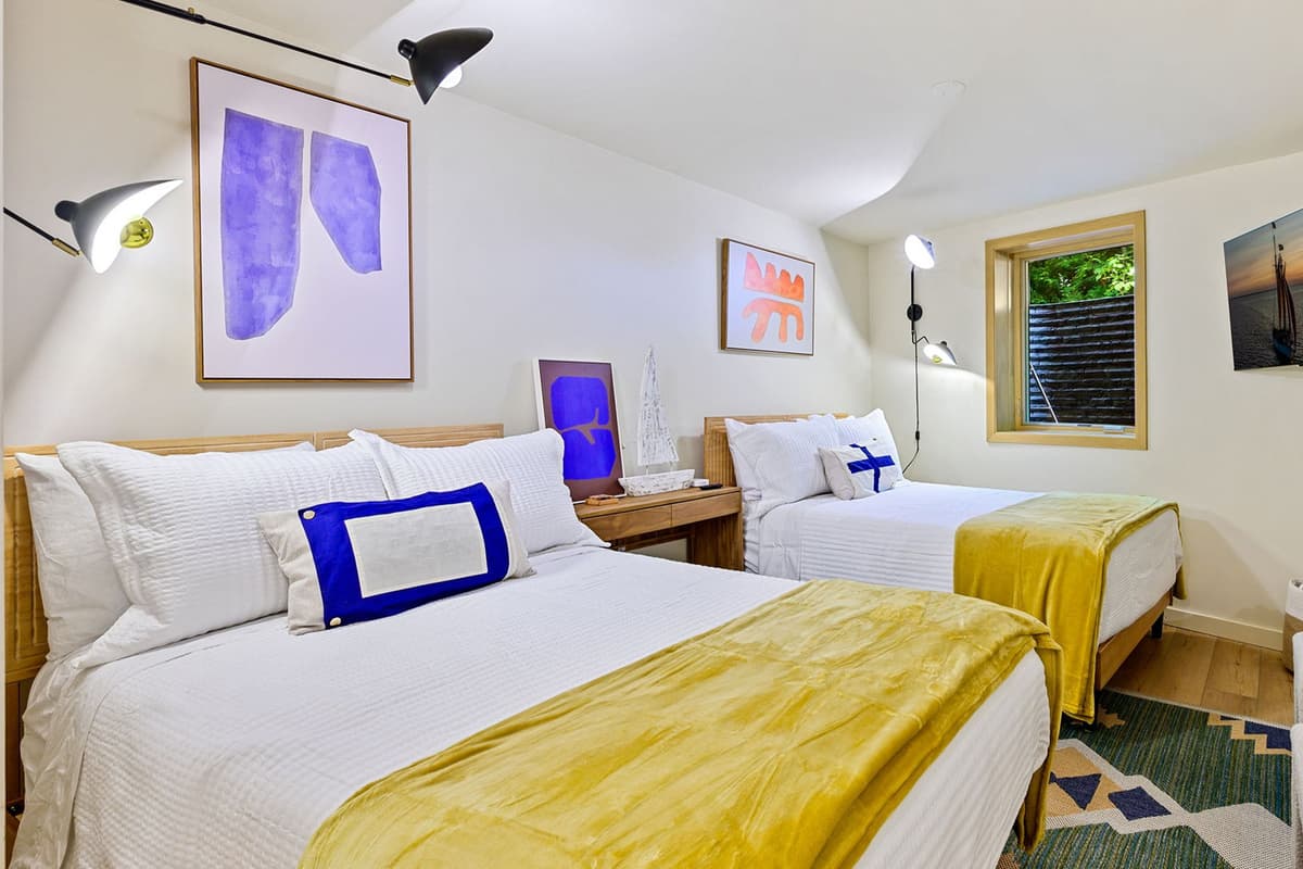 Two full-size beds make this bedroom a practical and comfortable space for your group.