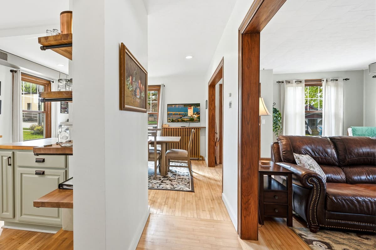 The thoughtfully designed layout brings the living, dining, and kitchen spaces together, creating an easy flow throughout the home.