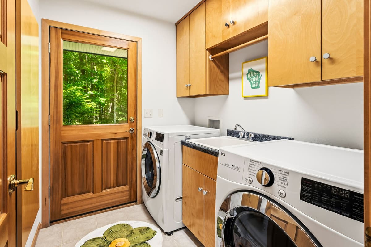A dedicated laundry room provides added convenience during your stay.
The space features both a washer and dryer for easy access to laundry whenever needed.