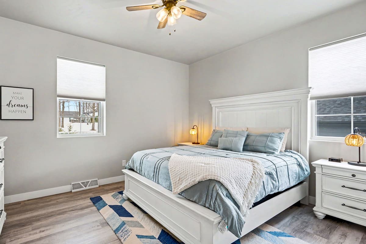Relax and recharge in this comfortable queen bedroom, a cozy space designed for a restful stay. The queen bed offers plenty of room to stretch out and unwind after a day of exploring.