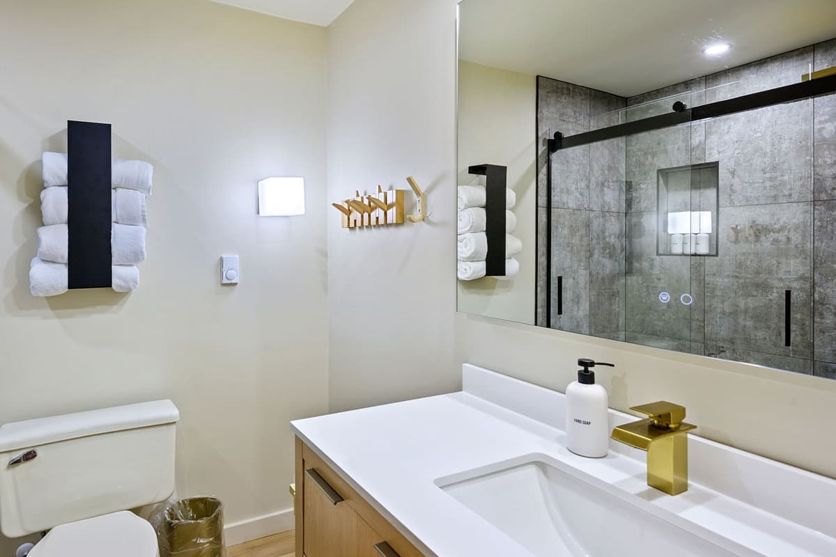 A full bathroom is conveniently located on the lower level for added comfort and convenience.