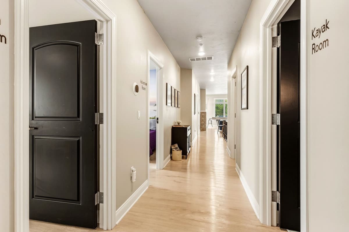 A spacious hallway provides easy access between the different areas of the home. The generous layout makes it comfortable to move around while keeping the bedrooms and living spaces conveniently connected. I