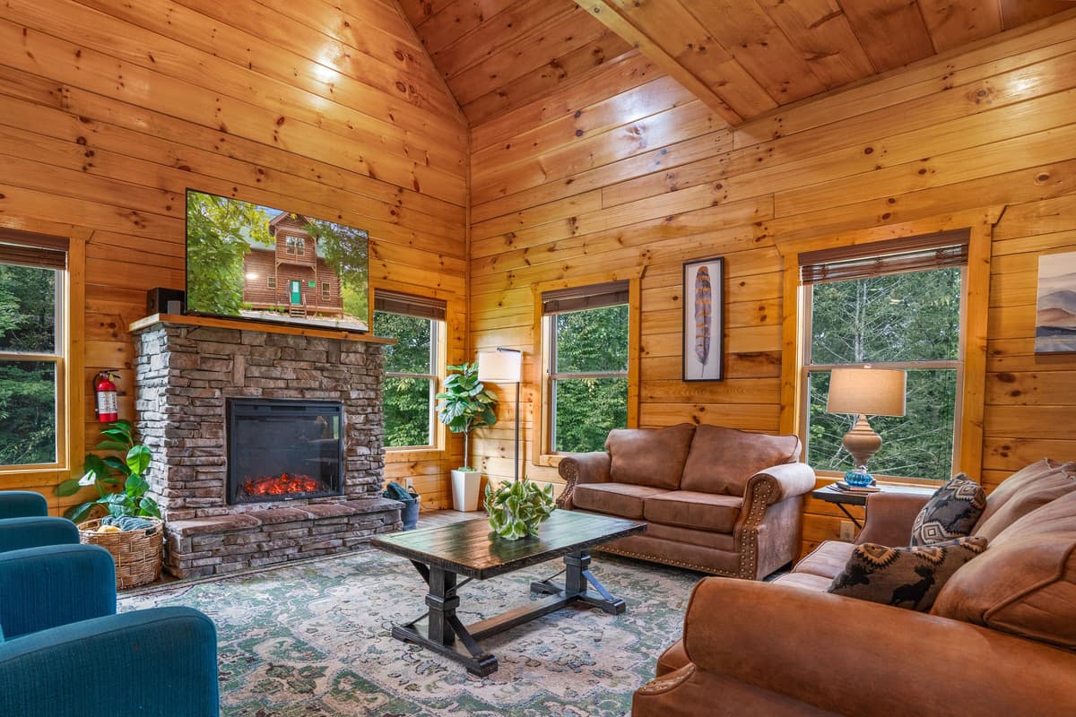 Warm wood details create a welcoming atmosphere that feels perfect for relaxing together. Settle onto the comfortable sofa and unwind after a day of Smoky Mountain adventures.