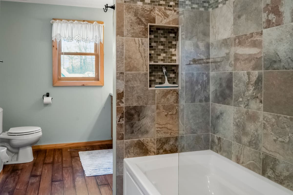 With a comfortable layout and essential amenities, it’s easily accessible from the upstairs living area and bedrooms.