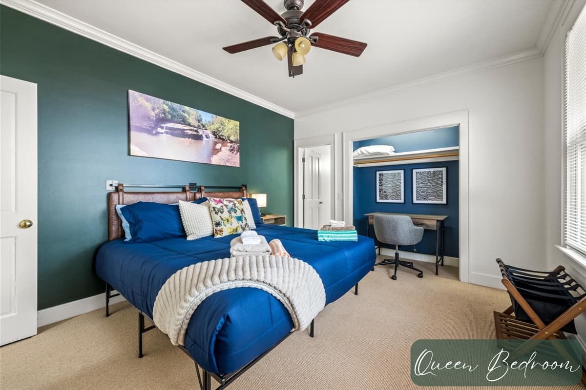 Queen Bedroom with Ceiling Fan, Blue Accents and Dedicated Workspace