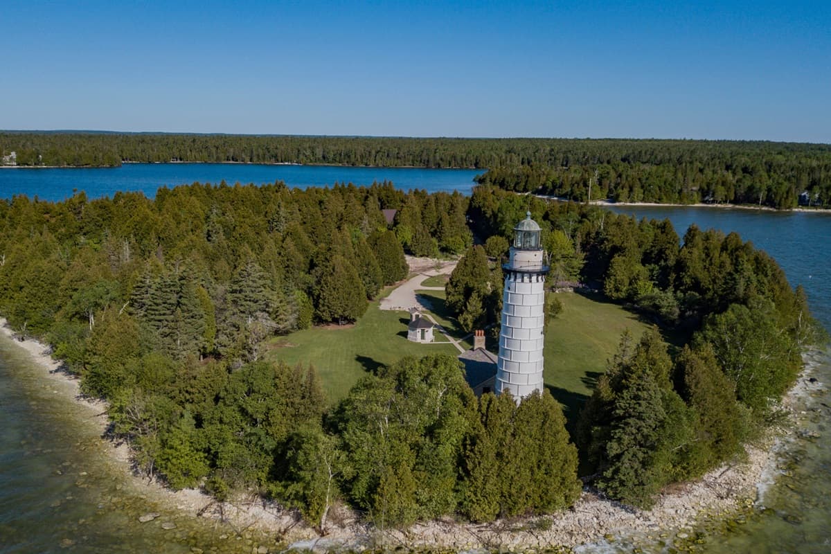 Cana Island is one of Baileys Harbor’s most iconic spots, home to a historic lighthouse surrounded by sparkling waters and stunning shoreline views.