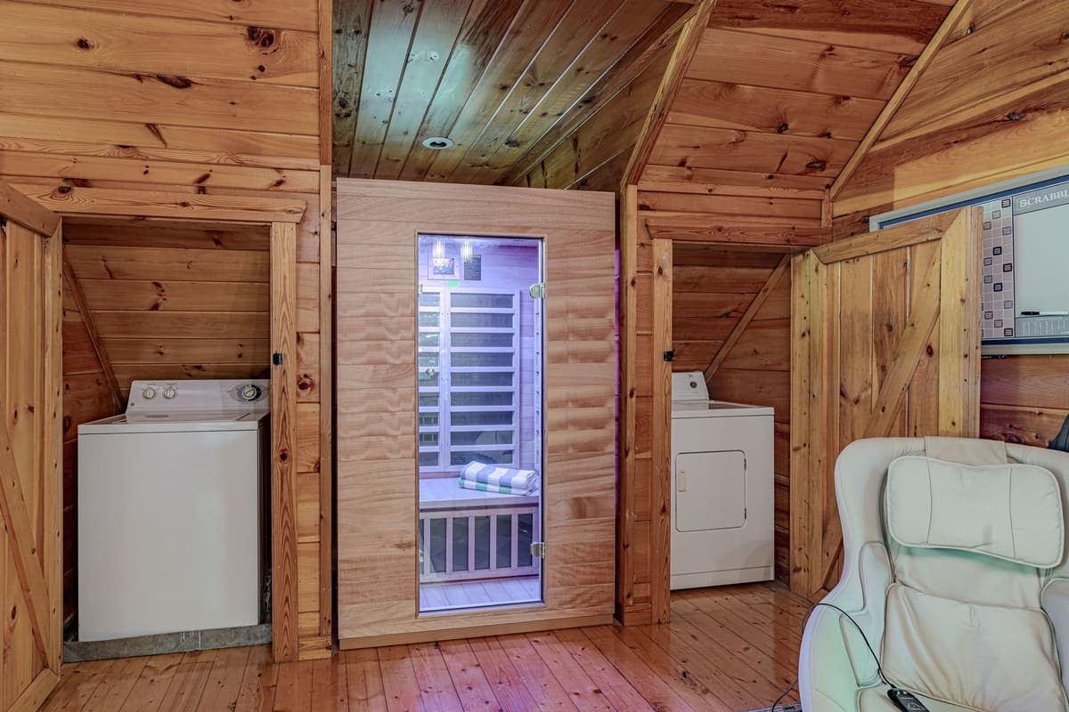 Maximize your comfort and convenience with this versatile upper-level space, featuring a relaxing infrared sauna for rejuvenation and a dedicated laundry area with a washer and dryer. It's designed to make your stay both enjoyable and practical.