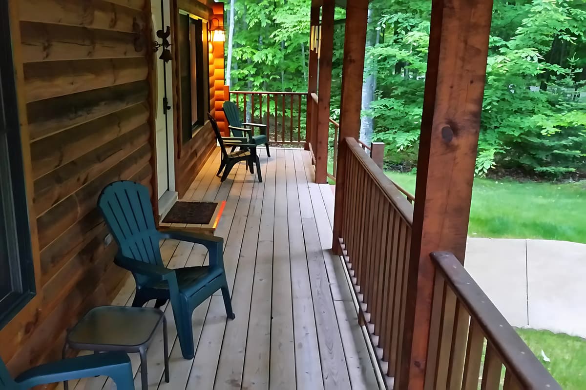 Step onto the welcoming entrance porch, the perfect spot to pause and enjoy the peaceful surroundings.