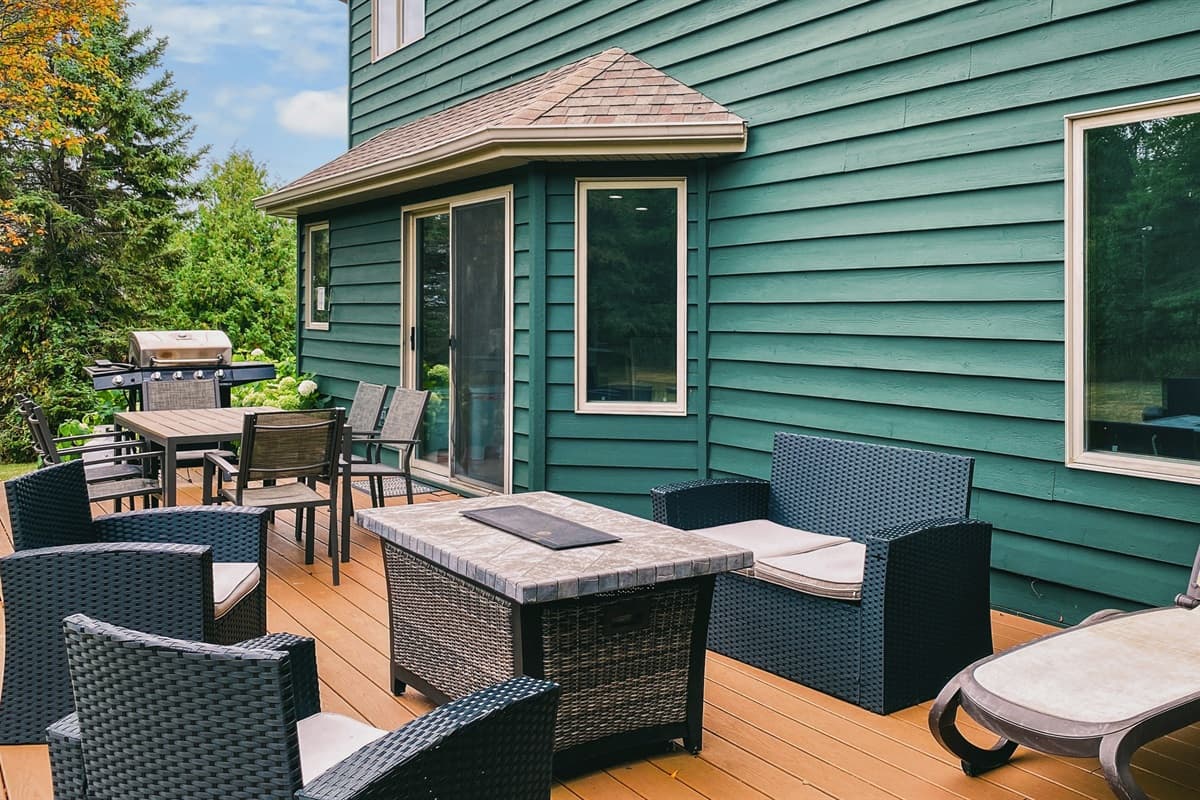 The natural beauty of the backyard adds to the charm of your stay.