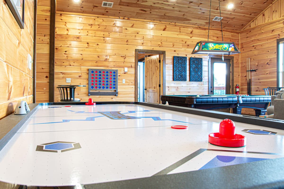 The air hockey table offers an entertaining way to spend time together without leaving the cabin.