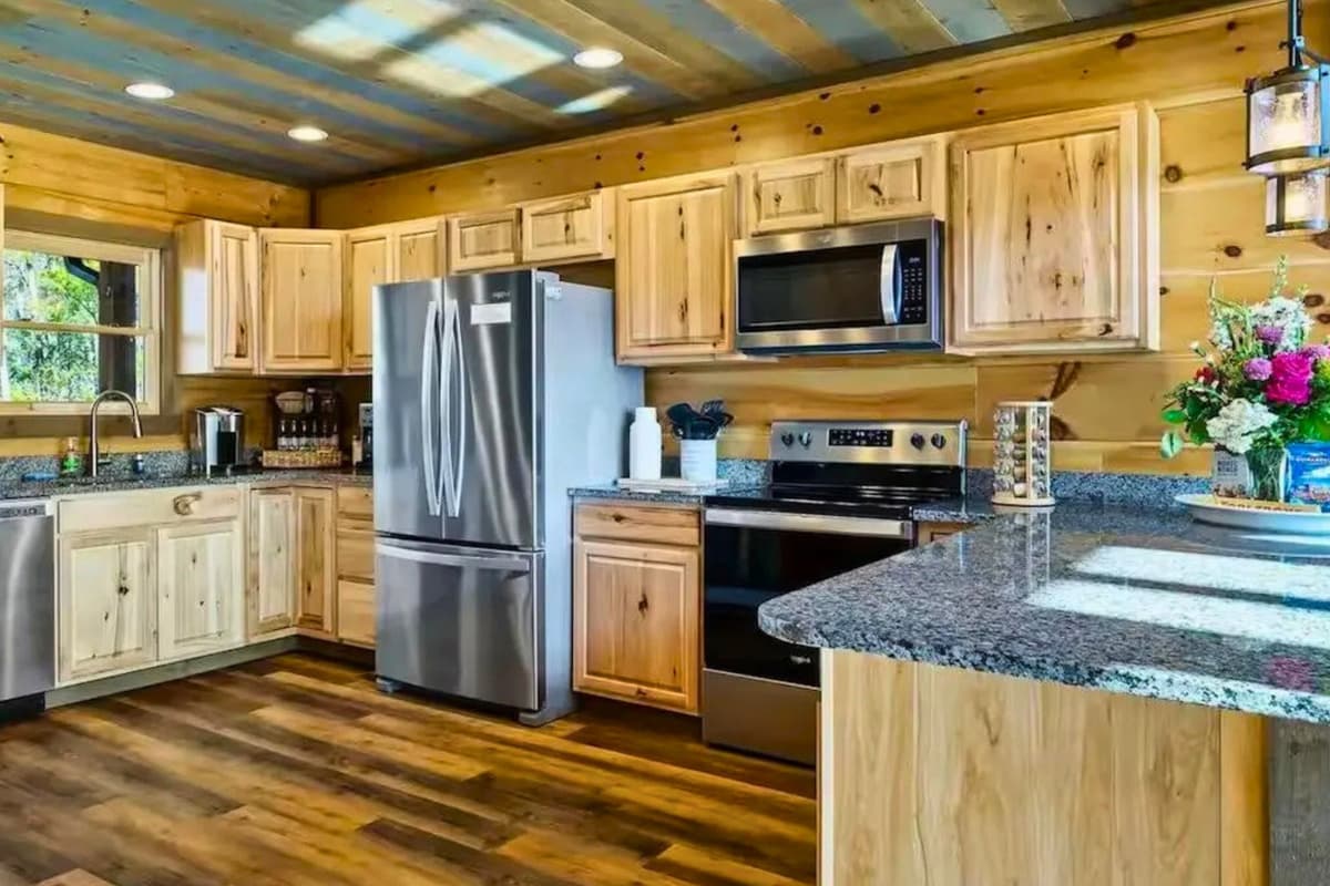 Cook, gather, and enjoy the comforts of home in the fully stocked kitchen.