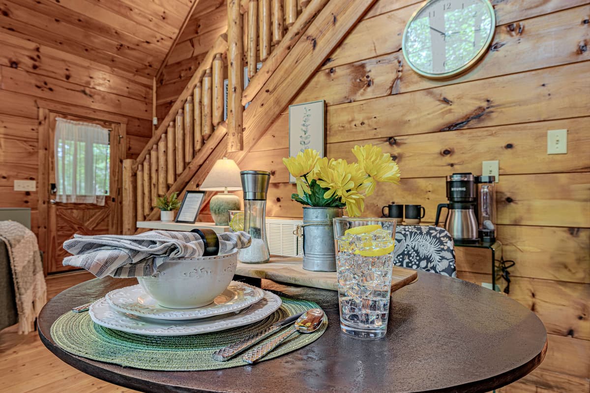 Whether you’re planning the day ahead or simply enjoying a slow moment together, this little dining nook adds to the cabin’s charm.