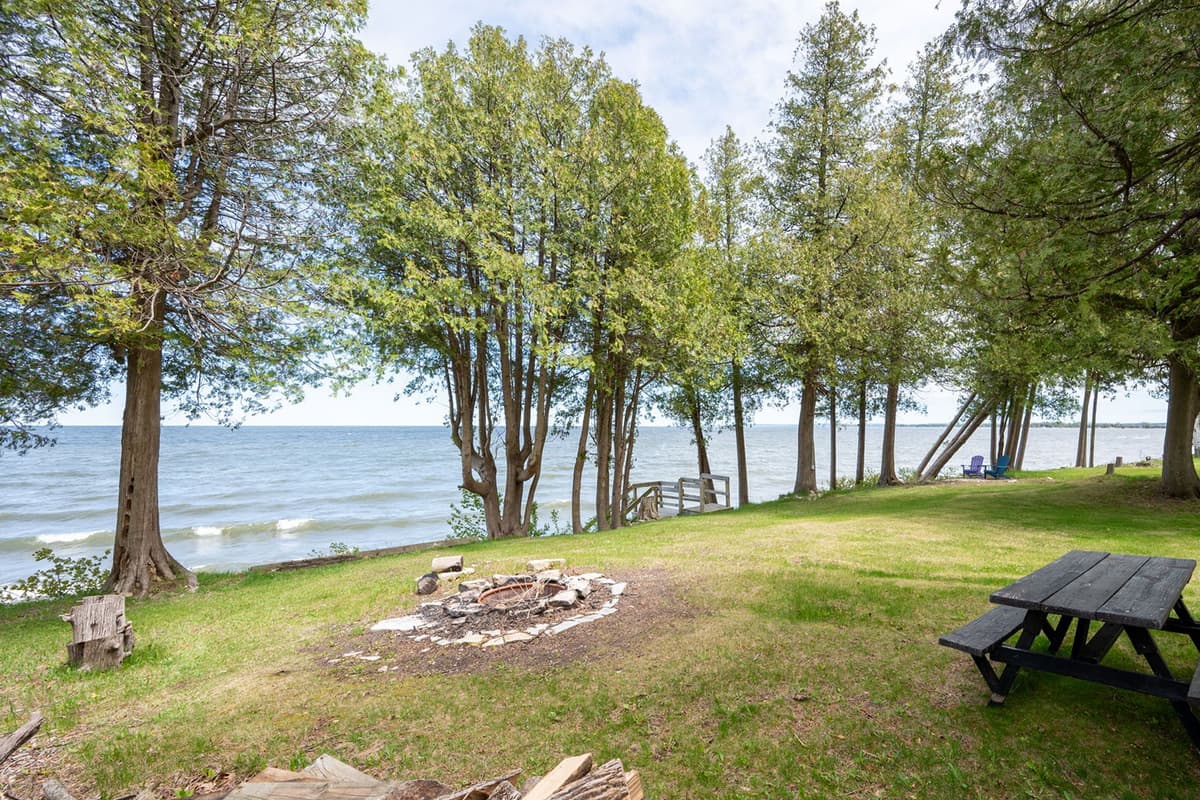 Gather around the outdoor fire pit and unwind in the peaceful surroundings.