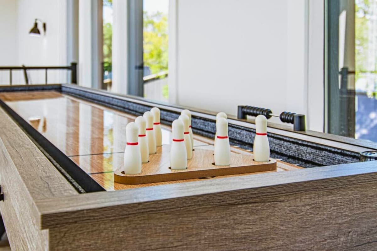 Challenge your group to a friendly game of shuffleboard right at home. It’s an easygoing way to add a little fun to your stay, whether you’re keeping score or just enjoying some friendly competition.