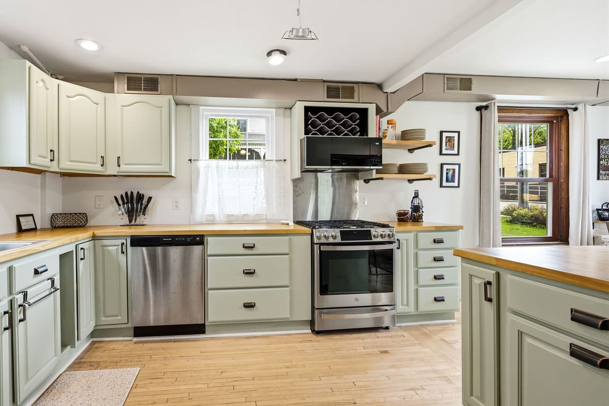 Cook, gather, and enjoy time together in the spacious kitchen, featuring stainless steel appliances and plenty of counter space.