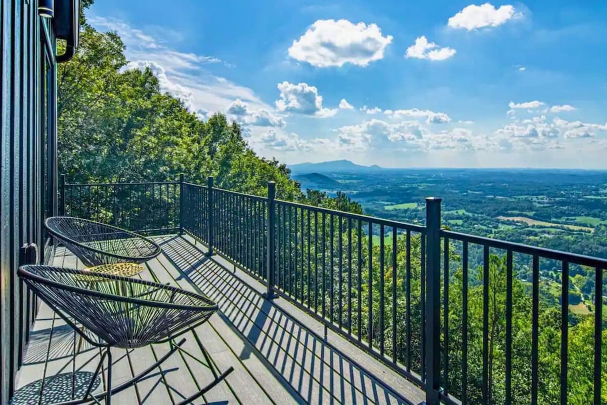 The spacious deck right outside the King bedroom takes you in the beautiful surrounding views.