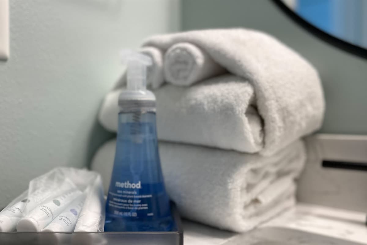 Each bathroom is stocked with fresh, clean towels and essential toiletries, ensuring you have everything you need for a refreshing shower or bath.