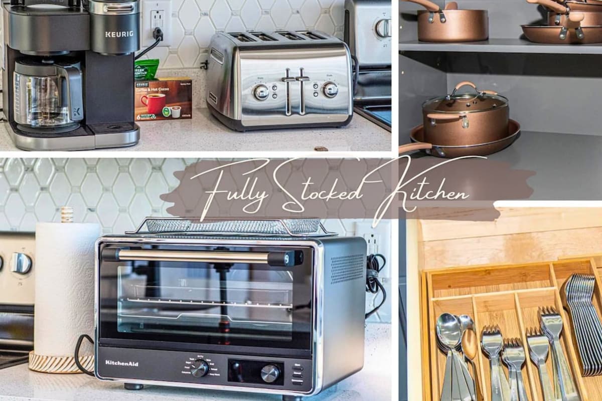 The kitchen is fully stocked with essential cookware, dishes, utensils, and serving pieces.acious layout makes meal prep easy while keeping everyone connected to the main living area.