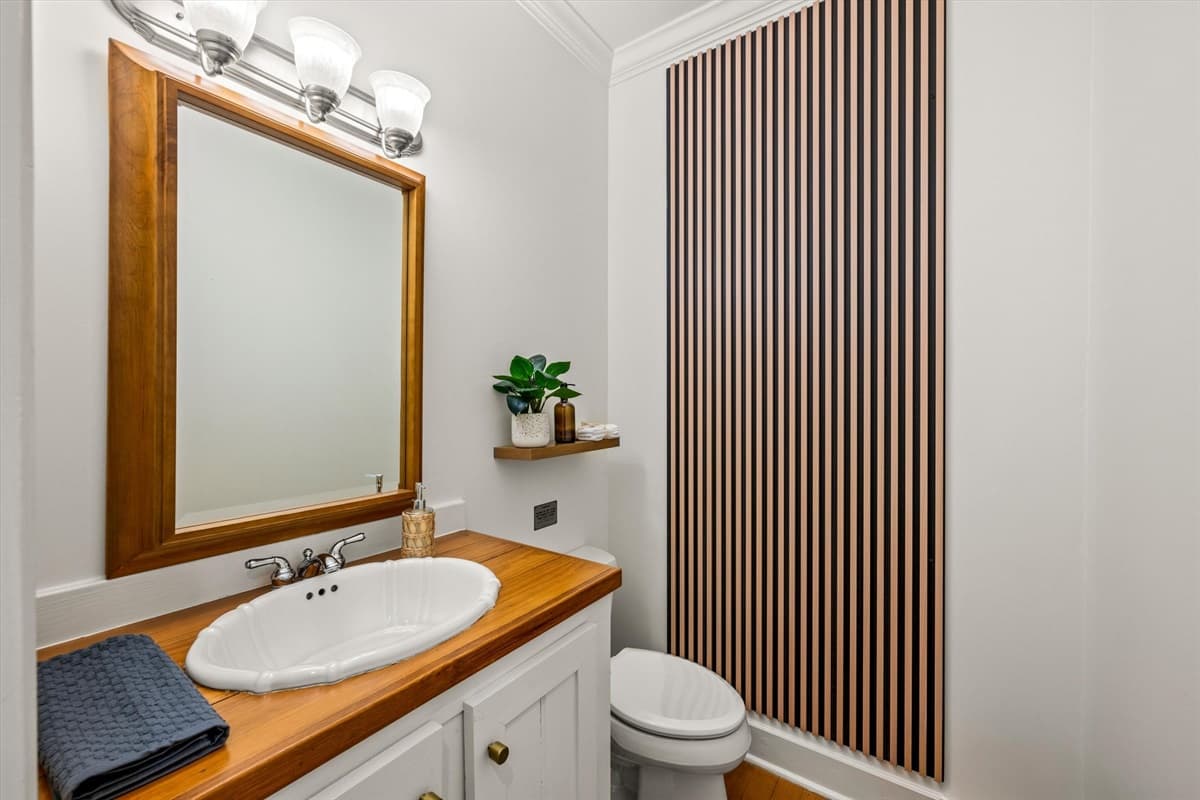 Half Bath Close to the Living Room and Kitchen