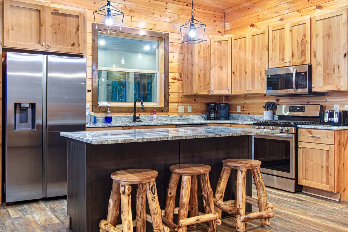 The well-equipped kitchen features modern appliances and plenty of counter space, making it easy to prepare everything from quick breakfasts to family dinners.