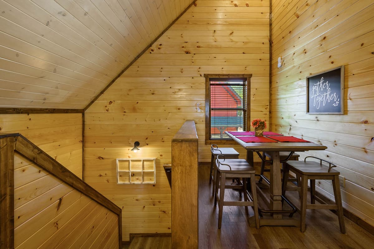 The upper level offers a cozy retreat away from the main living spaces. Enjoy easy access to the game area for family-friendly fun and friendly competition.