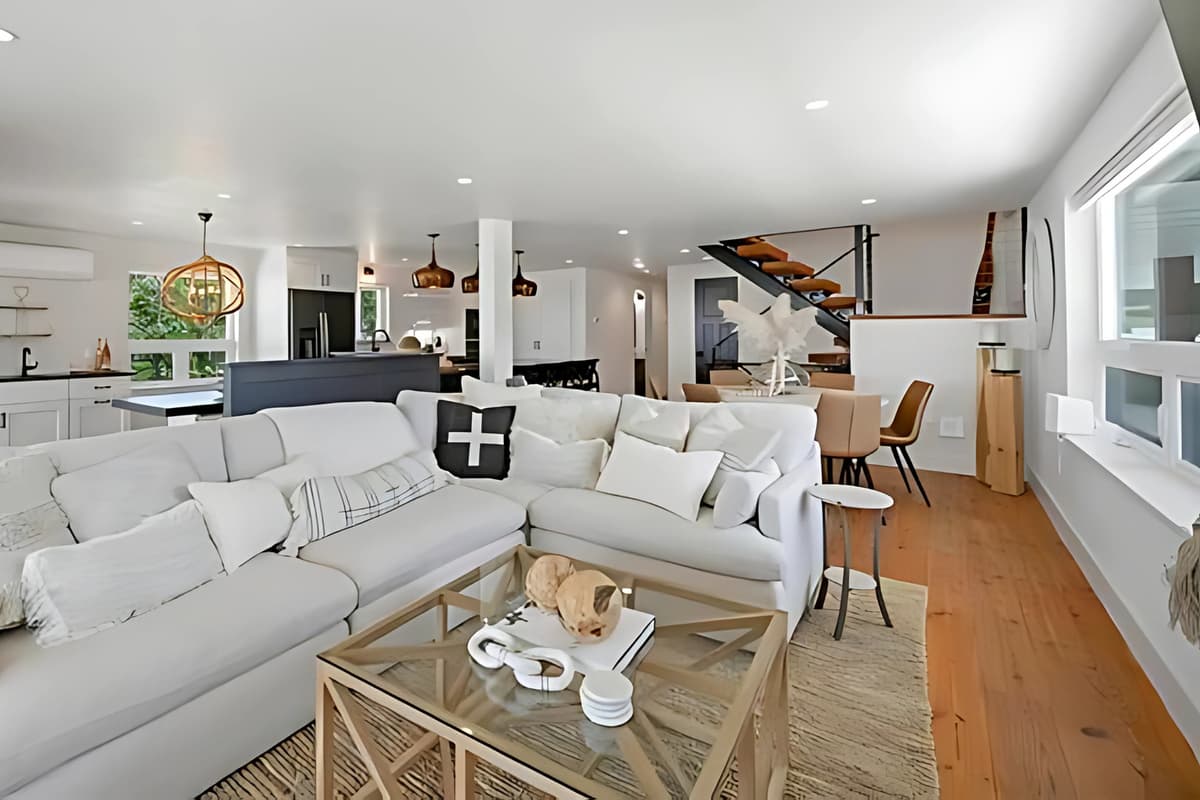 The spacious open-concept living area creates a welcoming space where everyone can relax and spend time together.