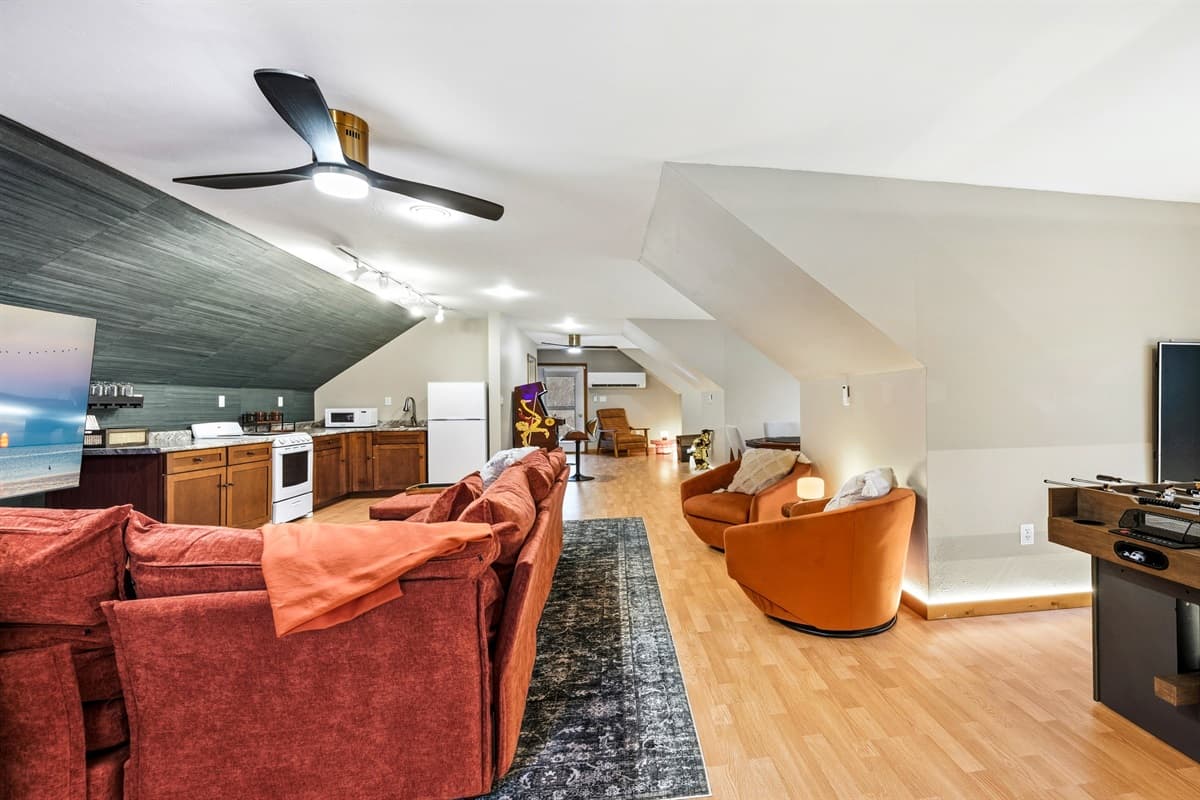 The media and game room is the ultimate entertainment space for all ages, offering year-round comfort with its own air conditioner and heating.