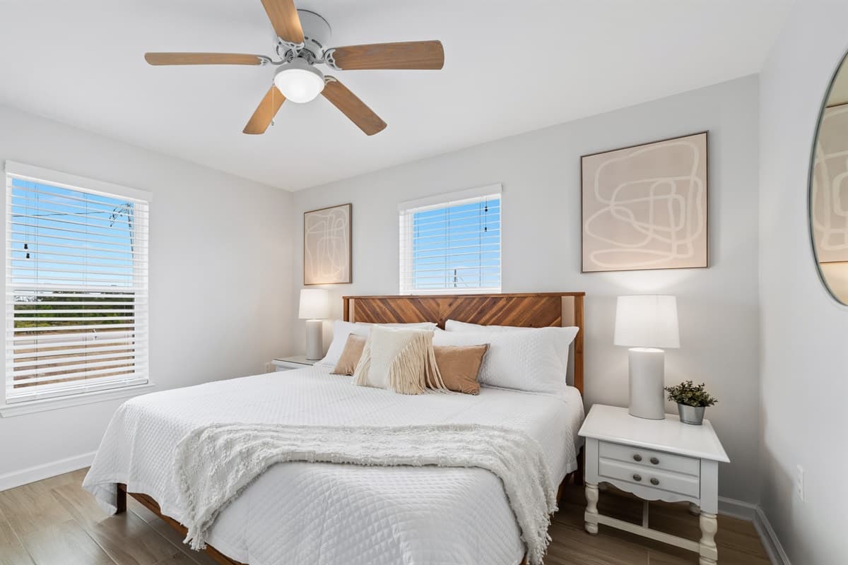 Our king bedroom boasts big windows that fill the space with natural light, creating a bright and inviting retreat for the whole family to enjoy!