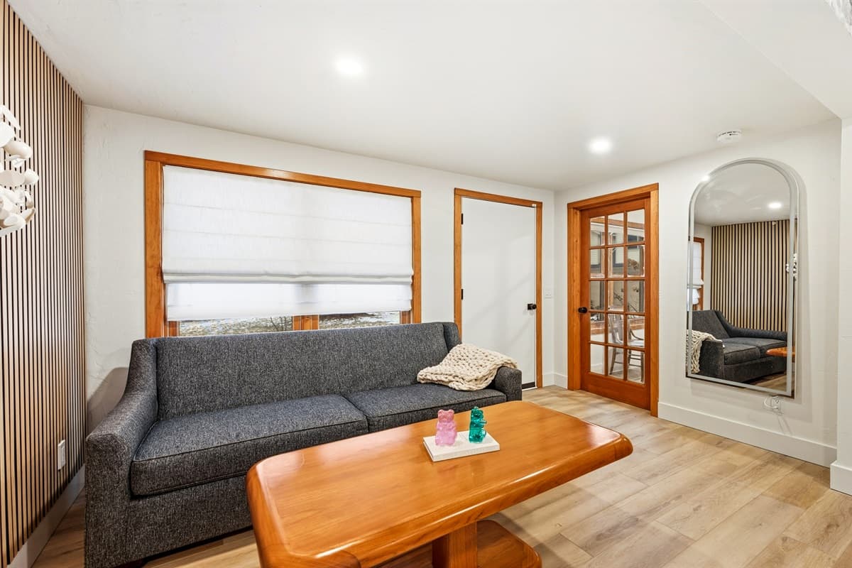 The room is designed with comfort in mind, boasting soft, high-thread-count linens and tasteful decor that blends modern and rustic elements.