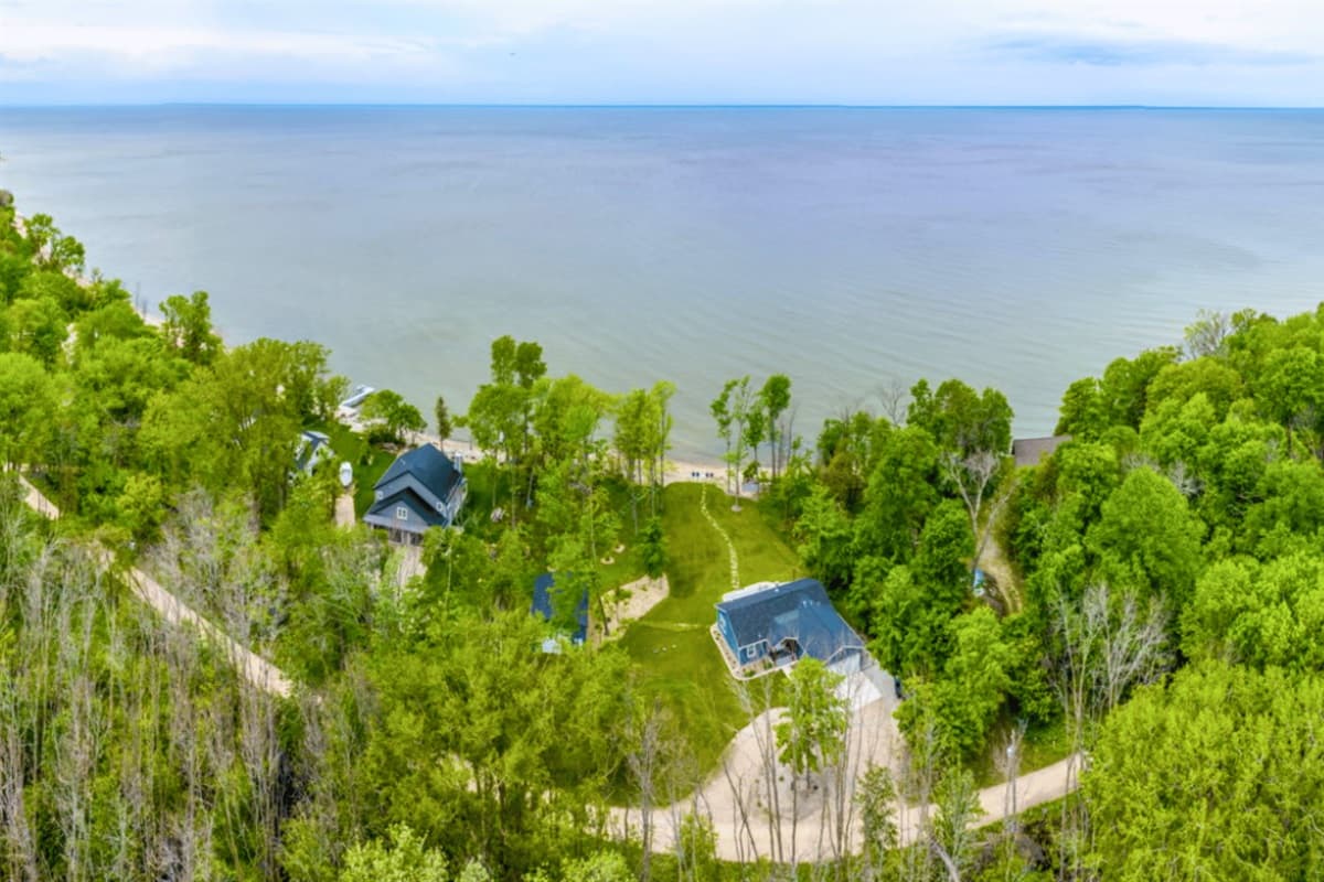 Escape to your lakeside retreat, where calm waters and stunning views await. This vacation house offers the perfect blend of relaxation and adventure, with the lake just steps away from your door.