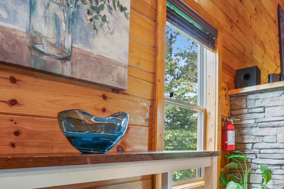 Warm wood accents and cozy finishes create a welcoming mountain-lodge atmosphere.