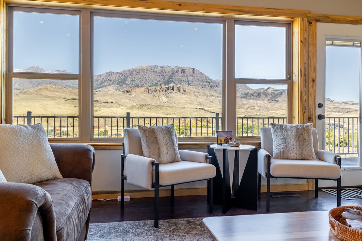Large windows fill the space with natural light and showcase the beautiful Wyoming scenery.