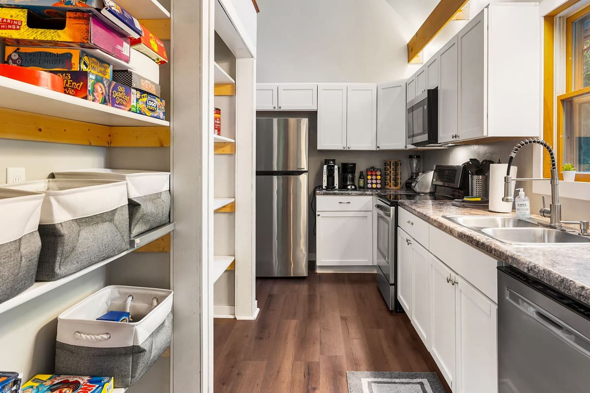 Featuring sleek stainless steel appliances, it has everything you need to prepare meals throughout your stay.