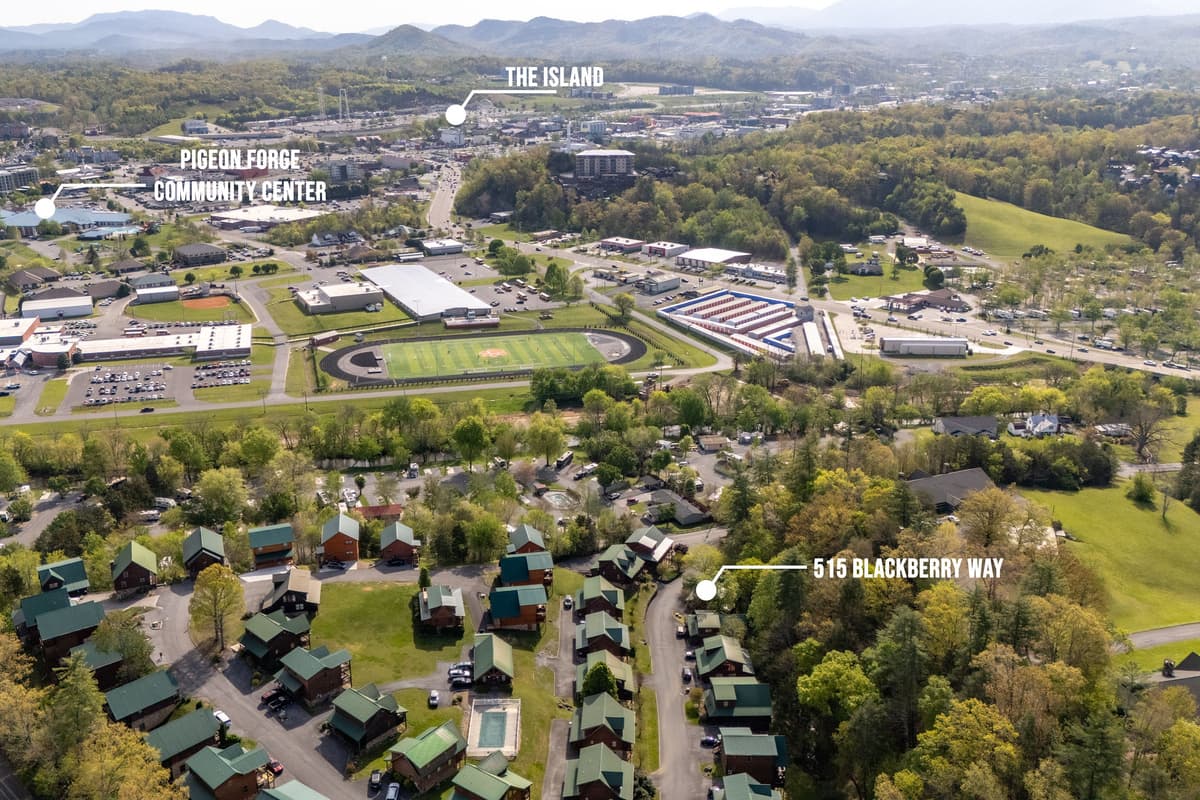 This aerial view highlights the excellent location of our cabin, offering a balance of natural surroundings and convenient access to nearby attractions like "The Island". See how easily you can reach local points of interest while still enjoying the peacef